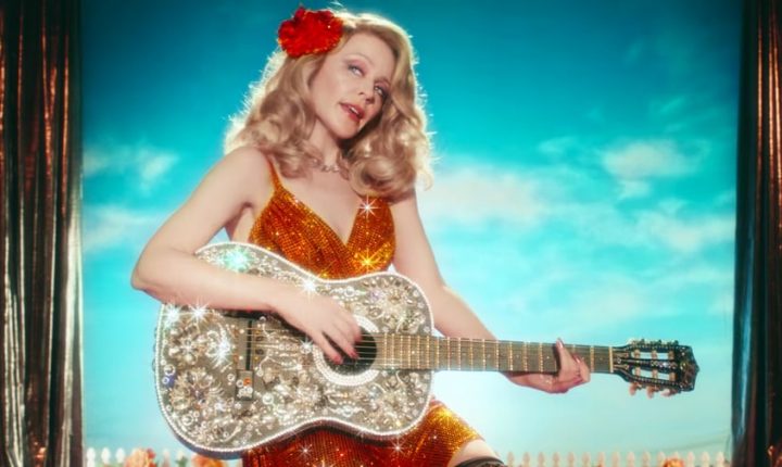 Watch Kylie Minogue Channel Dolly Parton in New ‘Dancing’ Video